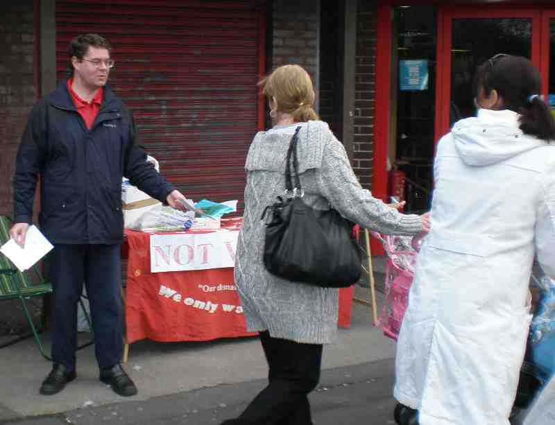 The candidate leaflets and talks to locals