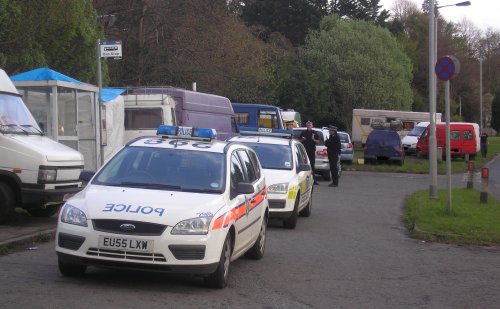 Police prevented car-park access and forced vans to park on the verge