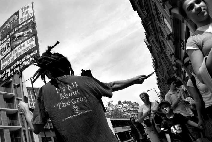 Handing leaflet to child