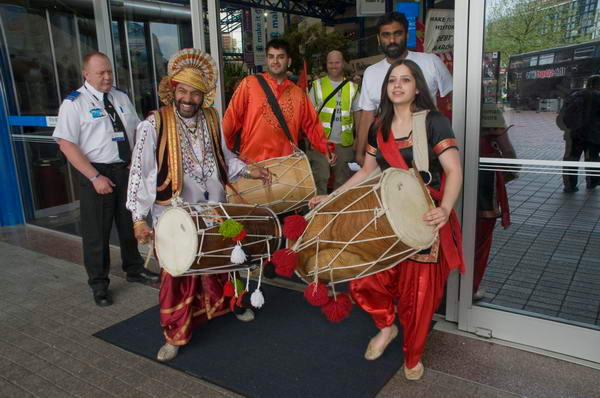 Kumi Naidoo and the Dhol Blasters led the rally out to demonstrate