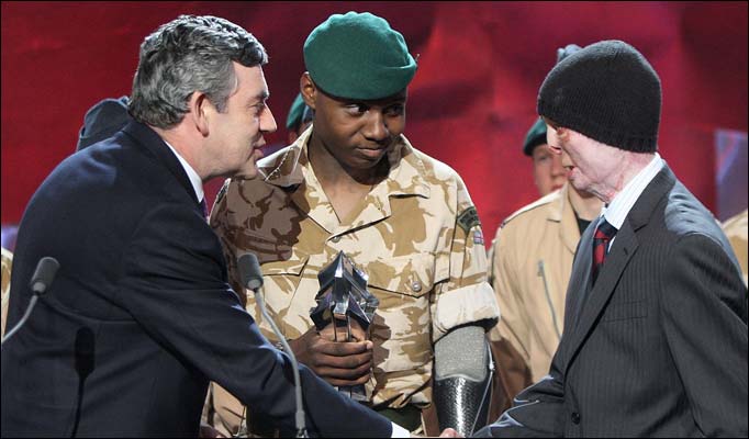 Shake and awe ... PM Brown congratulates Martyn Compton as Ben McBean looks on