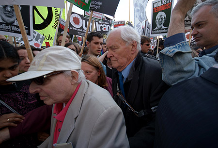 Walter Wolfgang and Labour MP, Tony Benn, leave the crowd