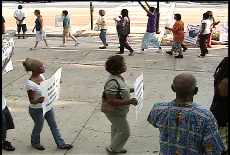 Uhuru Movement protests the killing by police of 17-year-old Javon Dawson