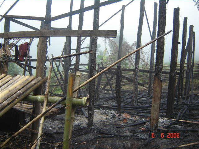 Home burned in Te Mu Der village on 4 June 2008
