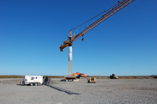 Climbing in the crane and putting up the banner