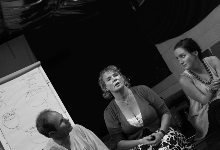 UK, London. Oval. Speakers respond to questions from caravan crowd.