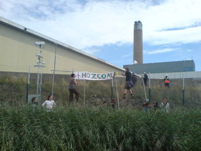 Protestors at Electric fence