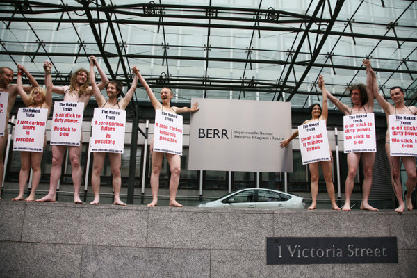 Naked protesters stand bravely in a line outside the BERR.