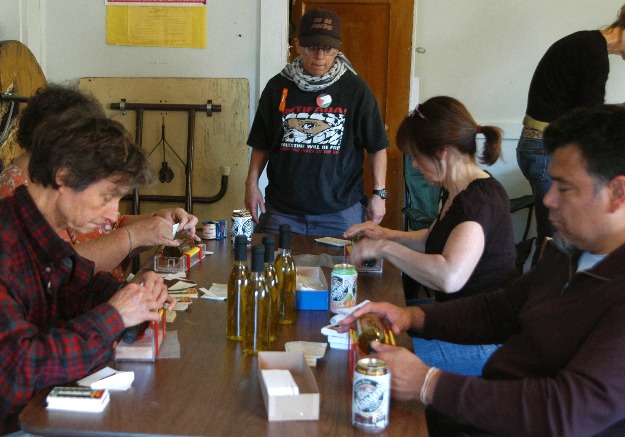 Darlene Wallach (standing) working with volunteers at the labeling station