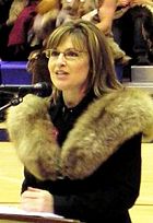 Is Palin wearing 1 or 2 skins of animals here?