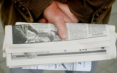 English Newspaper reader.