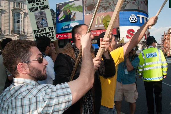 Waving banners at the counter demonstrators