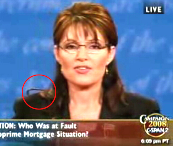 Cable visible over Palin's right shoulder