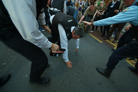 Knocked to the ground.