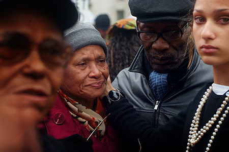 Comforted outside Downing Street.