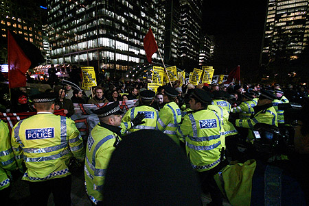 Police clash with the crowd.