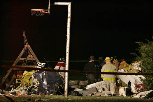 Firefighters quickly extinguish flames that engulfed fuselage.