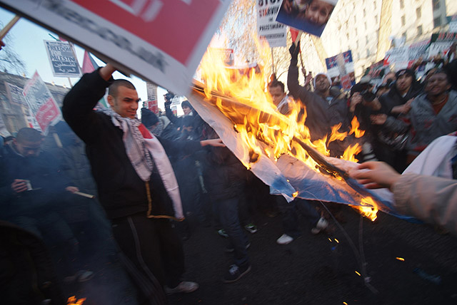 The Israeli flag burns outside Downing Street.