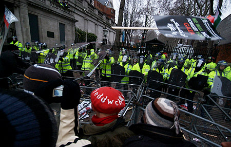 Police deploy armoured officers.