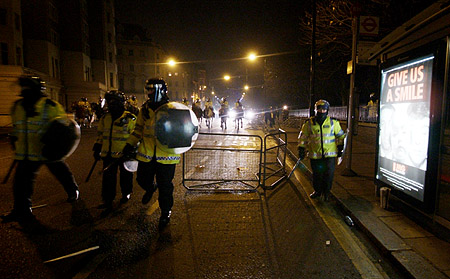 Ordering everybody out of the area.