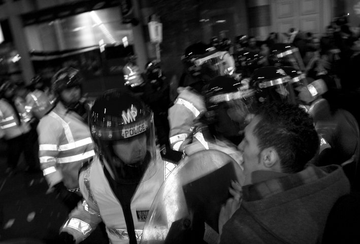 10.01.09 Gaza solidarity demo. Police charge the crowd with shields.