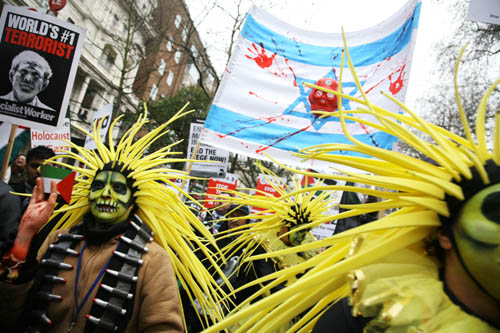 Dressed up protesters marching in the cold streets of London