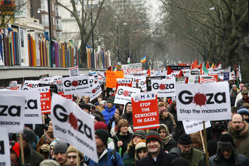 Tens of thousands of protesters marching in the cold streets of London