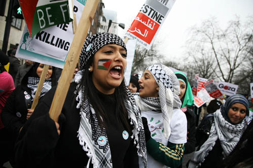 Tens of thousands of protesters marching in the cold streets of London