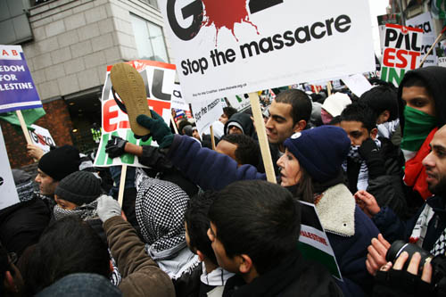 The march has arrived at the Israeli Embassy, - heavily protected by the MET