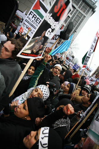 The march has arrived at the Israeli Embassy, - heavily protected by the MET