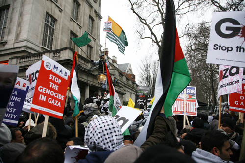The march has arrived at the Israeli Embassy, - heavily protected by the MET