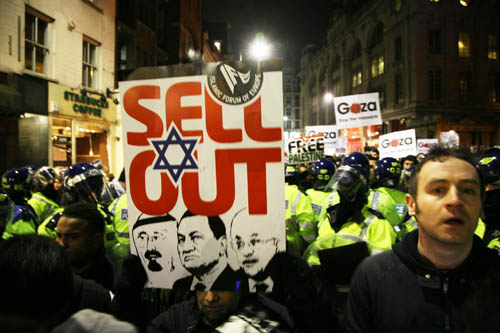 Waiting to be let out after being detained by police for hours.