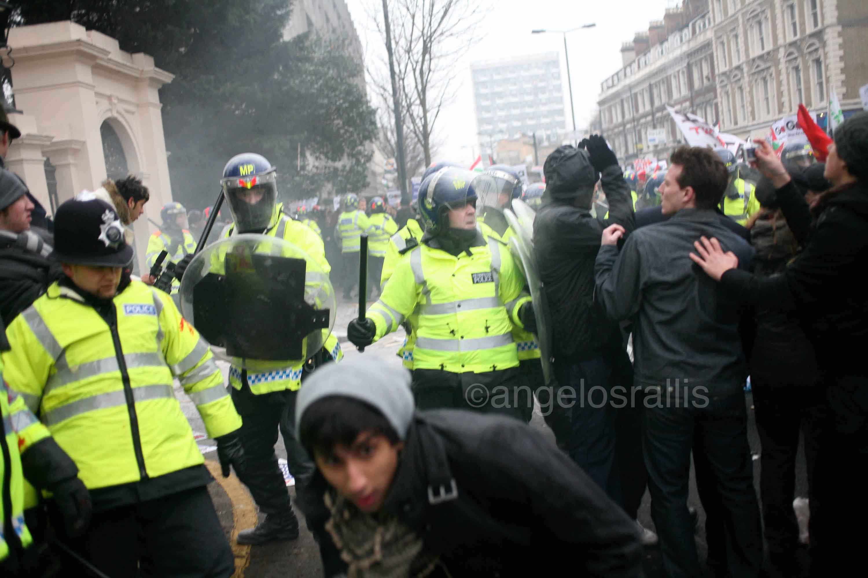 Anti-riot officers breaking in