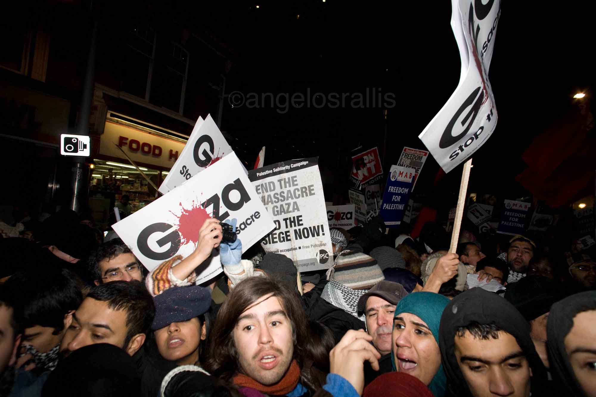 Protesters suffocating while trapped between cops breaking in and barriers