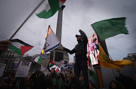 Israeli flag burned.