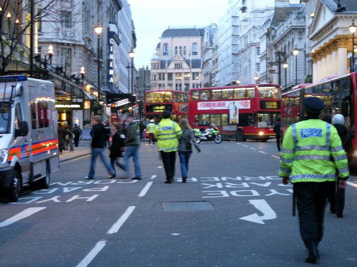 Woman arrested for "interfering with police work"