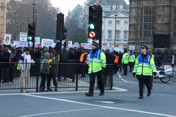 Marchers still streaming past, 4pm