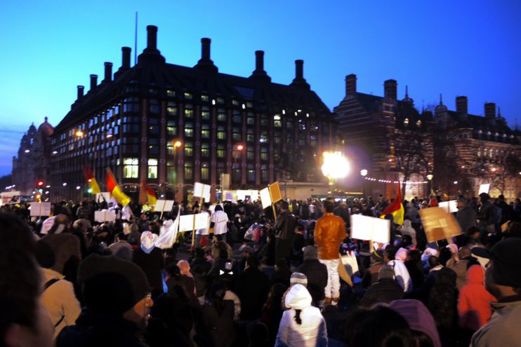 As darkness falls, the crowd hold the bridge, 5pm
