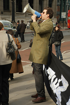 Man with a loudhailer.