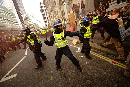 Police clash with the crowd.
