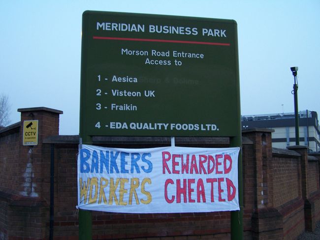 Banner on entrance to industrial estate.