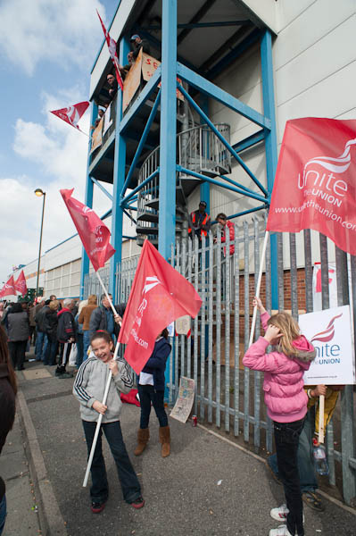 Children outside the occupied plant