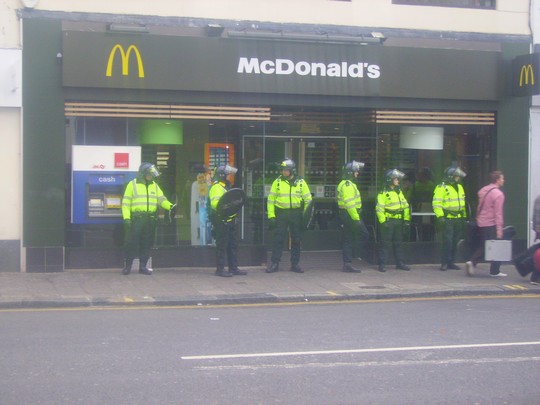 Riot police guarding McDonalds