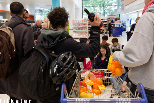 protesters gather produce & denounce tesco's support of israeli settlements