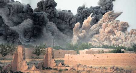 B1-B bomber delivers 2,000 lb bomb upon alleged Taliban positions in the village