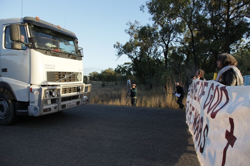Members of the Catholic Worker movement along with fellow peace activists blocki
