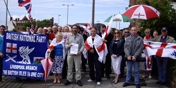 A gloating Tierney with gathered fascists outside St Anne's Police Station