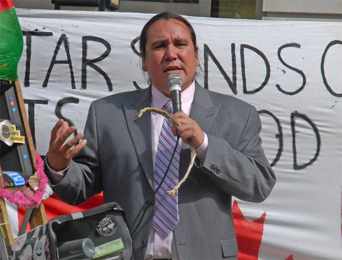 Clayton Thomas-Muller of the Indigenous Environmental Network outside BP's HQ