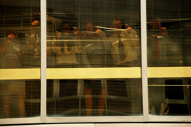 Barclays employees looking on.