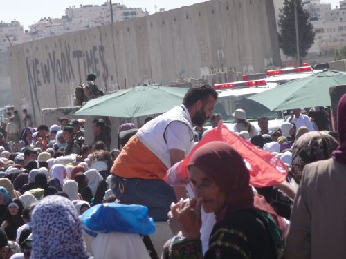 Parademics pull a woman from the crush